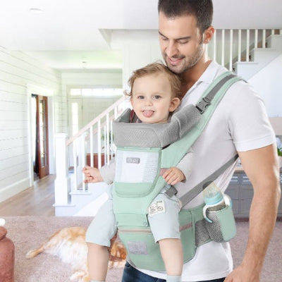 Porte bebe multi-fonctionnel vert pastel papa bebe un an