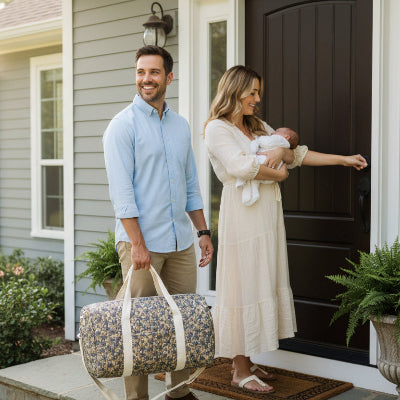sac a langer feuillu foncé papa porte sac maman porte bebe devant maison